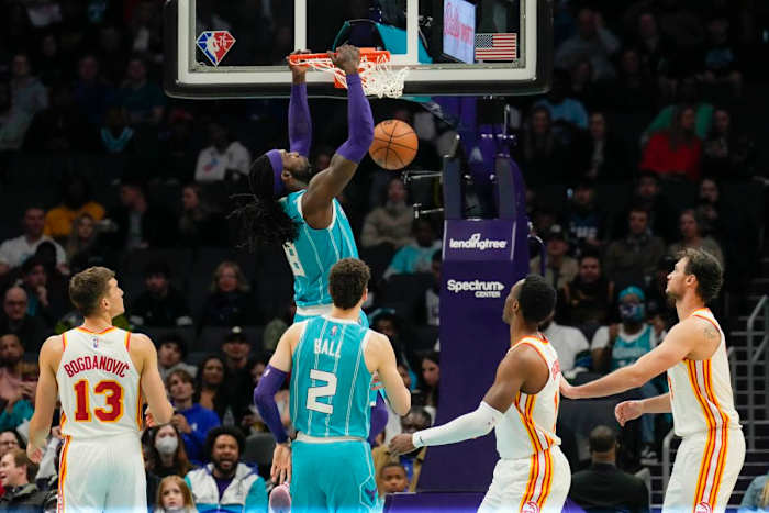 Mar 16, 2022; Charlotte, North Carolina, USA; Charlotte Hornets center Montrezl Harrell (8) dunks against the Atlanta Hawks during the second quarter at the Spectrum Center.